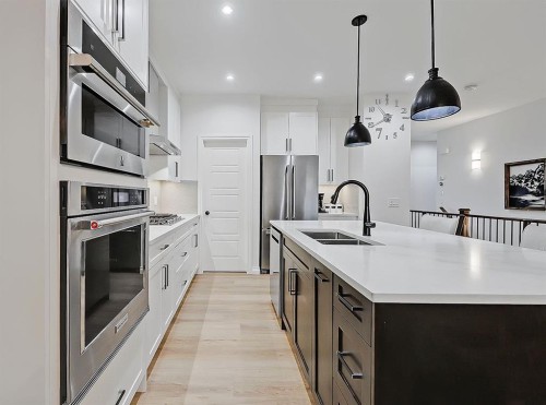 1627 Montrose Terrace Se, High River, AB - Indoor Photo Showing Kitchen With Double Sink With Upgraded Kitchen