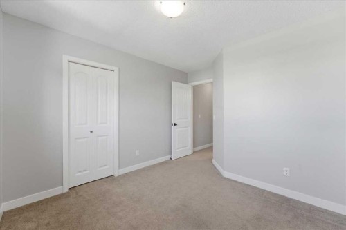 34 Everoak Gardens Sw, Calgary, AB - Indoor Photo Showing Other Room