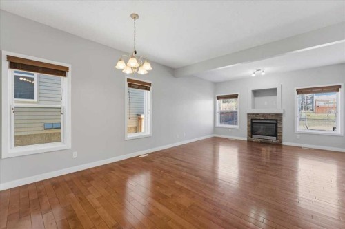 34 Everoak Gardens Sw, Calgary, AB - Indoor Photo Showing Other Room With Fireplace
