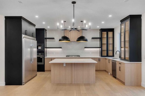 153 Waterford Passage, Chestermere, AB - Indoor Photo Showing Kitchen With Upgraded Kitchen