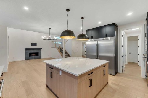 153 Waterford Passage, Chestermere, AB - Indoor Photo Showing Kitchen With Upgraded Kitchen