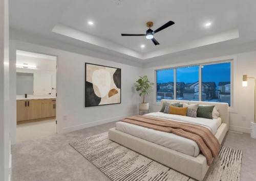 153 Waterford Passage, Chestermere, AB - Indoor Photo Showing Bedroom