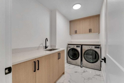 153 Waterford Passage, Chestermere, AB - Indoor Photo Showing Laundry Room