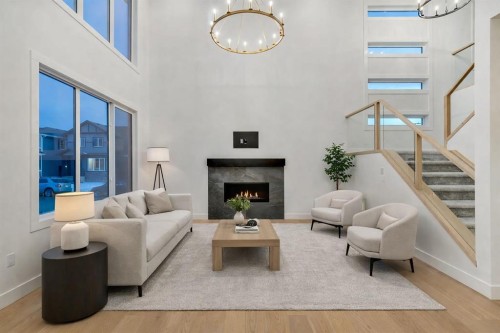 153 Waterford Passage, Chestermere, AB - Indoor Photo Showing Living Room With Fireplace