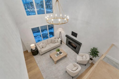 153 Waterford Passage, Chestermere, AB - Indoor With Fireplace