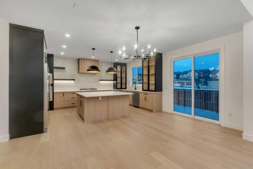 153 Waterford Passage, Chestermere, AB - Indoor Photo Showing Kitchen With Upgraded Kitchen