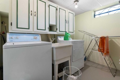 87 Hillgrove Drive Sw, Calgary, AB - Indoor Photo Showing Laundry Room