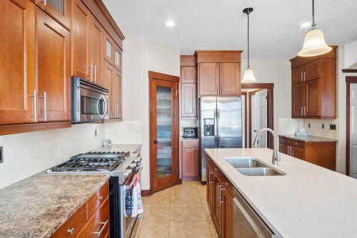 5939 Park Meadows Crescent, Olds, AB - Indoor Photo Showing Kitchen With Stainless Steel Kitchen With Double Sink With Upgraded Kitchen