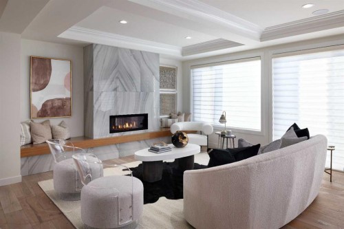 42 Setonridge Way Se, Calgary, AB - Indoor Photo Showing Living Room With Fireplace