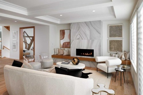 42 Setonridge Way Se, Calgary, AB - Indoor Photo Showing Living Room With Fireplace