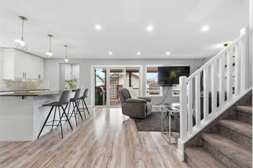 23 Prestwick Green Se, Calgary, AB - Indoor Photo Showing Kitchen With Upgraded Kitchen