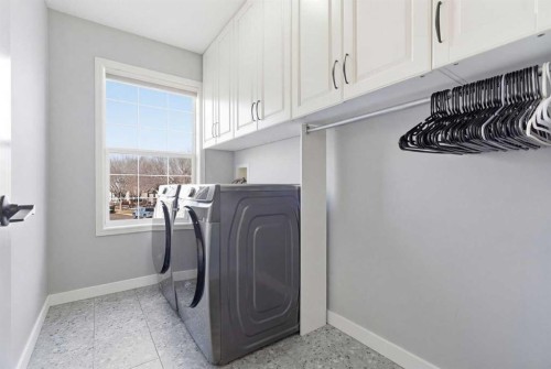 23 Prestwick Green Se, Calgary, AB - Indoor Photo Showing Laundry Room