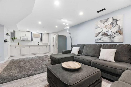 23 Prestwick Green Se, Calgary, AB - Indoor Photo Showing Living Room