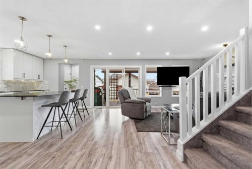 23 Prestwick Green Se, Calgary, AB - Indoor Photo Showing Kitchen With Upgraded Kitchen