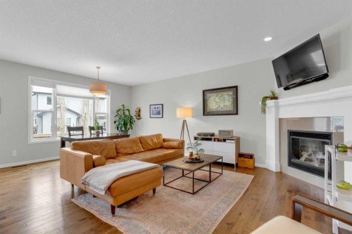 2052 Brightoncrest Green Se, Calgary, AB - Indoor Photo Showing Living Room With Fireplace