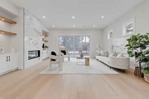 2021 26 Avenue Sw, Calgary, AB - Indoor Photo Showing Living Room With Fireplace