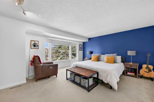 81 Queen Anne Close Se, Calgary, AB - Indoor Photo Showing Bedroom