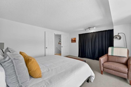 81 Queen Anne Close Se, Calgary, AB - Indoor Photo Showing Bedroom