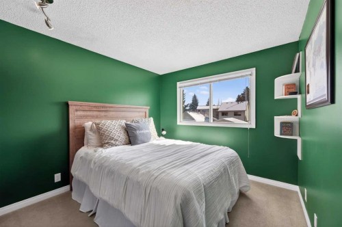 81 Queen Anne Close Se, Calgary, AB - Indoor Photo Showing Bedroom