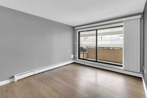 210-1602 11 Avenue Sw, Calgary, AB - Indoor Photo Showing Other Room