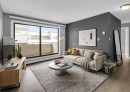 210-1602 11 Avenue Sw, Calgary, AB  - Indoor Photo Showing Living Room 