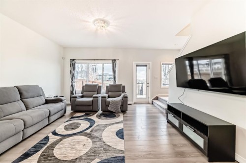 163 Evanscrest Way Nw, Calgary, AB - Indoor Photo Showing Living Room