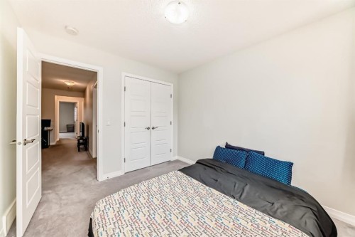 163 Evanscrest Way Nw, Calgary, AB - Indoor Photo Showing Bedroom