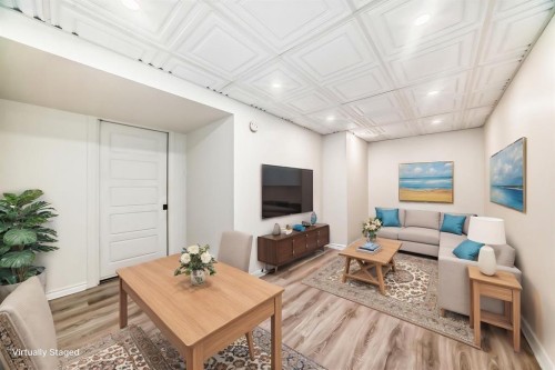 163 Evanscrest Way Nw, Calgary, AB - Indoor Photo Showing Living Room