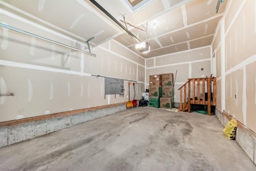 163 Evanscrest Way Nw, Calgary, AB - Indoor Photo Showing Garage