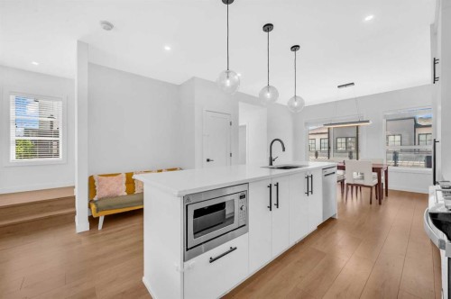 252-7820 Spring Willow Drive Sw, Calgary, AB - Indoor Photo Showing Kitchen With Upgraded Kitchen