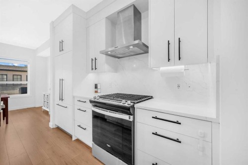 252-7820 Spring Willow Drive Sw, Calgary, AB - Indoor Photo Showing Kitchen With Upgraded Kitchen