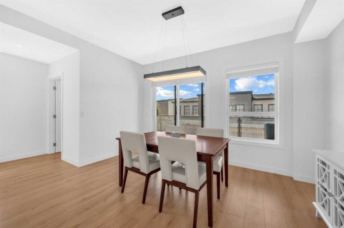 252-7820 Spring Willow Drive Sw, Calgary, AB - Indoor Photo Showing Dining Room