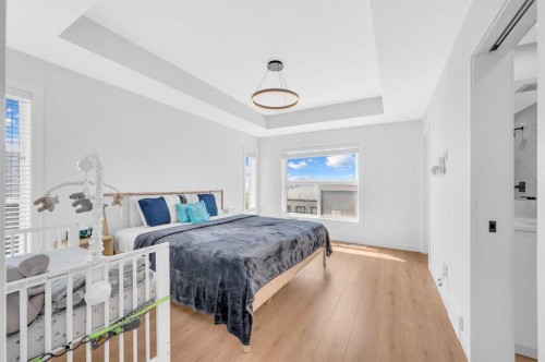 252-7820 Spring Willow Drive Sw, Calgary, AB - Indoor Photo Showing Bedroom
