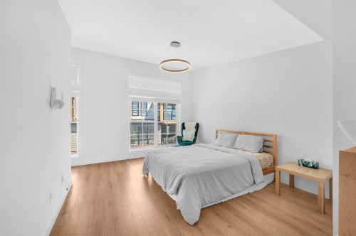 252-7820 Spring Willow Drive Sw, Calgary, AB - Indoor Photo Showing Bedroom