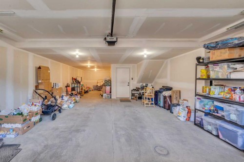 252-7820 Spring Willow Drive Sw, Calgary, AB - Indoor Photo Showing Garage