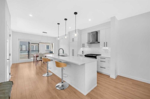 252-7820 Spring Willow Drive Sw, Calgary, AB - Indoor Photo Showing Kitchen With Upgraded Kitchen