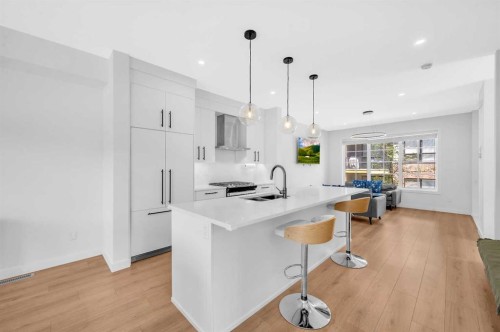 252-7820 Spring Willow Drive Sw, Calgary, AB - Indoor Photo Showing Kitchen With Upgraded Kitchen