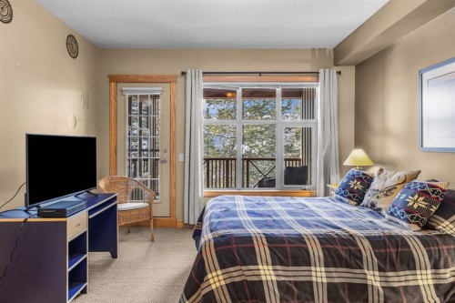 202-3 Aspen Glen, Canmore, AB - Indoor Photo Showing Bedroom