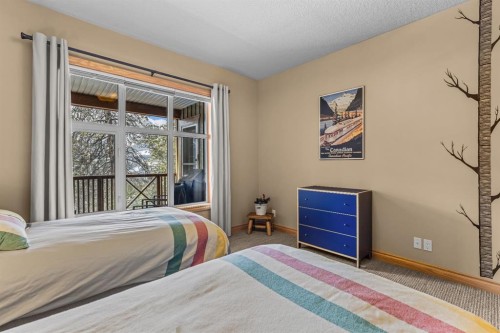 202-3 Aspen Glen, Canmore, AB - Indoor Photo Showing Bedroom