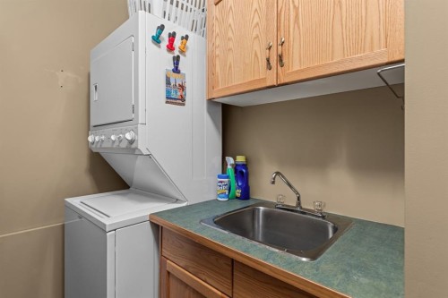 202-3 Aspen Glen, Canmore, AB - Indoor Photo Showing Laundry Room