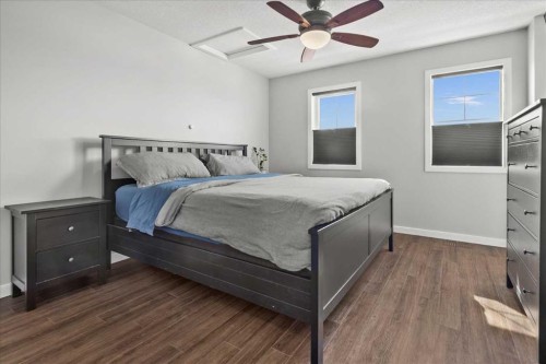 399 Copperpond Boulevard Se, Calgary, AB - Indoor Photo Showing Bedroom