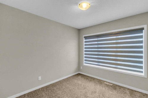 249 Aquila Drive Nw, Calgary, AB - Indoor Photo Showing Other Room