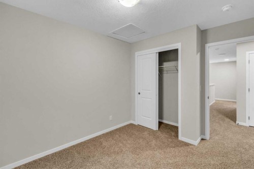 249 Aquila Drive Nw, Calgary, AB - Indoor Photo Showing Other Room