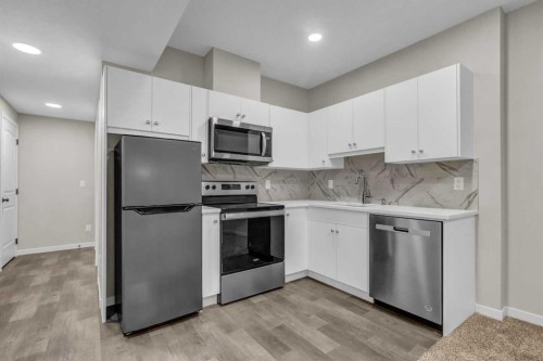 249 Aquila Drive Nw, Calgary, AB - Indoor Photo Showing Kitchen
