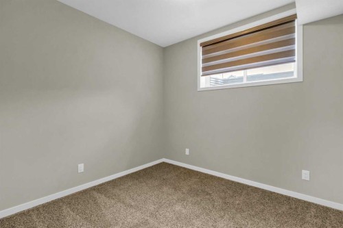 249 Aquila Drive Nw, Calgary, AB - Indoor Photo Showing Other Room