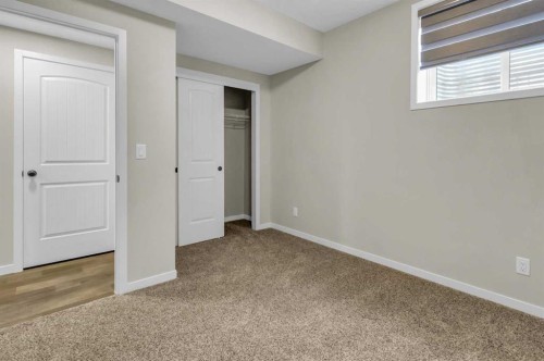 249 Aquila Drive Nw, Calgary, AB - Indoor Photo Showing Other Room