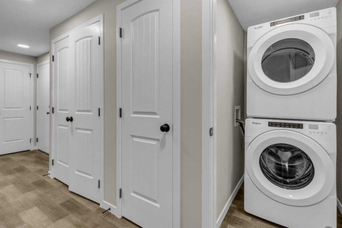 249 Aquila Drive Nw, Calgary, AB - Indoor Photo Showing Laundry Room