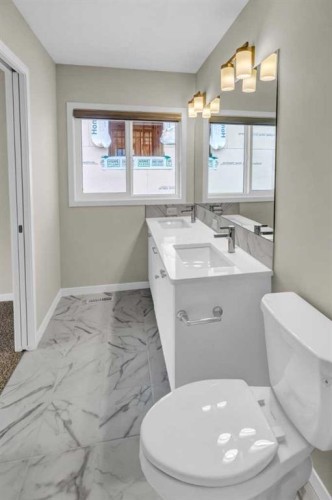 249 Aquila Drive Nw, Calgary, AB - Indoor Photo Showing Bathroom