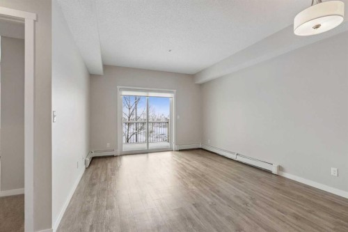 9205-101 Sunset Drive, Cochrane, AB - Indoor Photo Showing Other Room