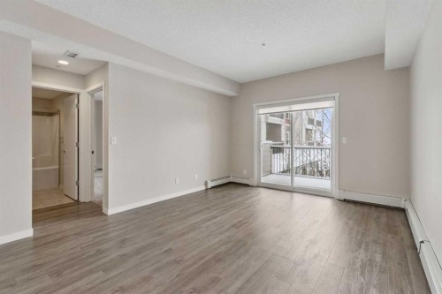 9205-101 Sunset Drive, Cochrane, AB - Indoor Photo Showing Other Room